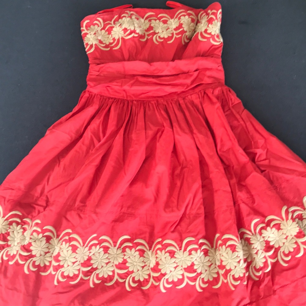 Burnt orange strapless dress